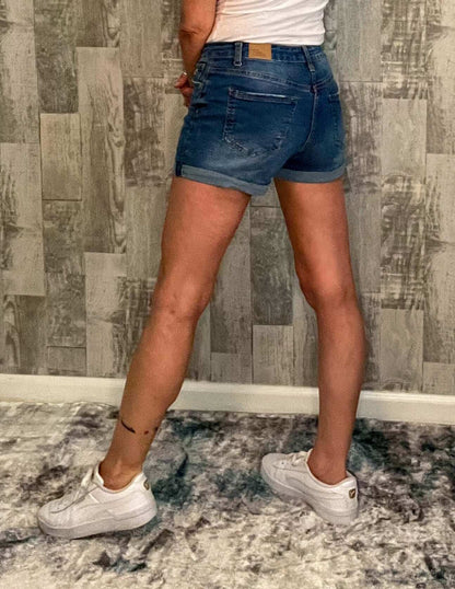 Shorts 73% Cotton 22% Polyester 3% Rayon 2% Spandex, blue wash, clothing, denim, denim shorts, distressed, folded hem, jeans, mid-rise, mid-rise denim shorts, shorts, zip fly, zip fly with button closure Size: Small, Meduim, Large