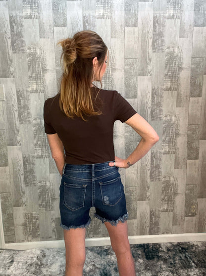 Shorts 4 button front closure, 5 pocket design, 94.9% Cotton 3.8% Polyester 1.3% Rayon, bottoms, button-fly front, clothing, denim, distressed, distressed details, fading, frayed raw hem, Jean shorts, jeans, Justine, KanCan, KanCan Justine Mid Rise Shorts
