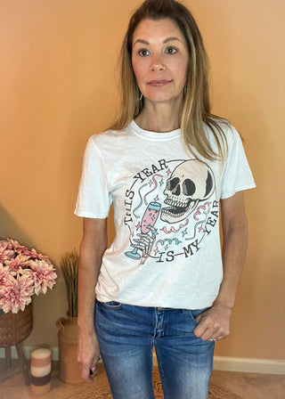 Festive skull graphic tee with pink and blue confetti