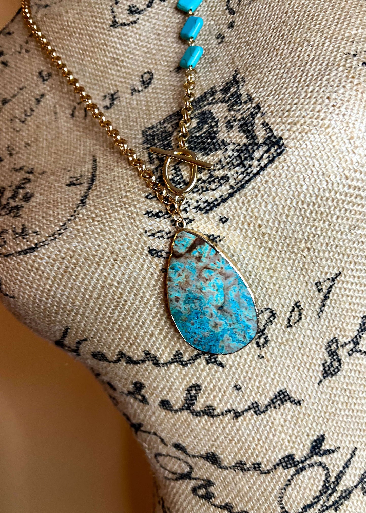 Close-up shot of the turquoise pendant
