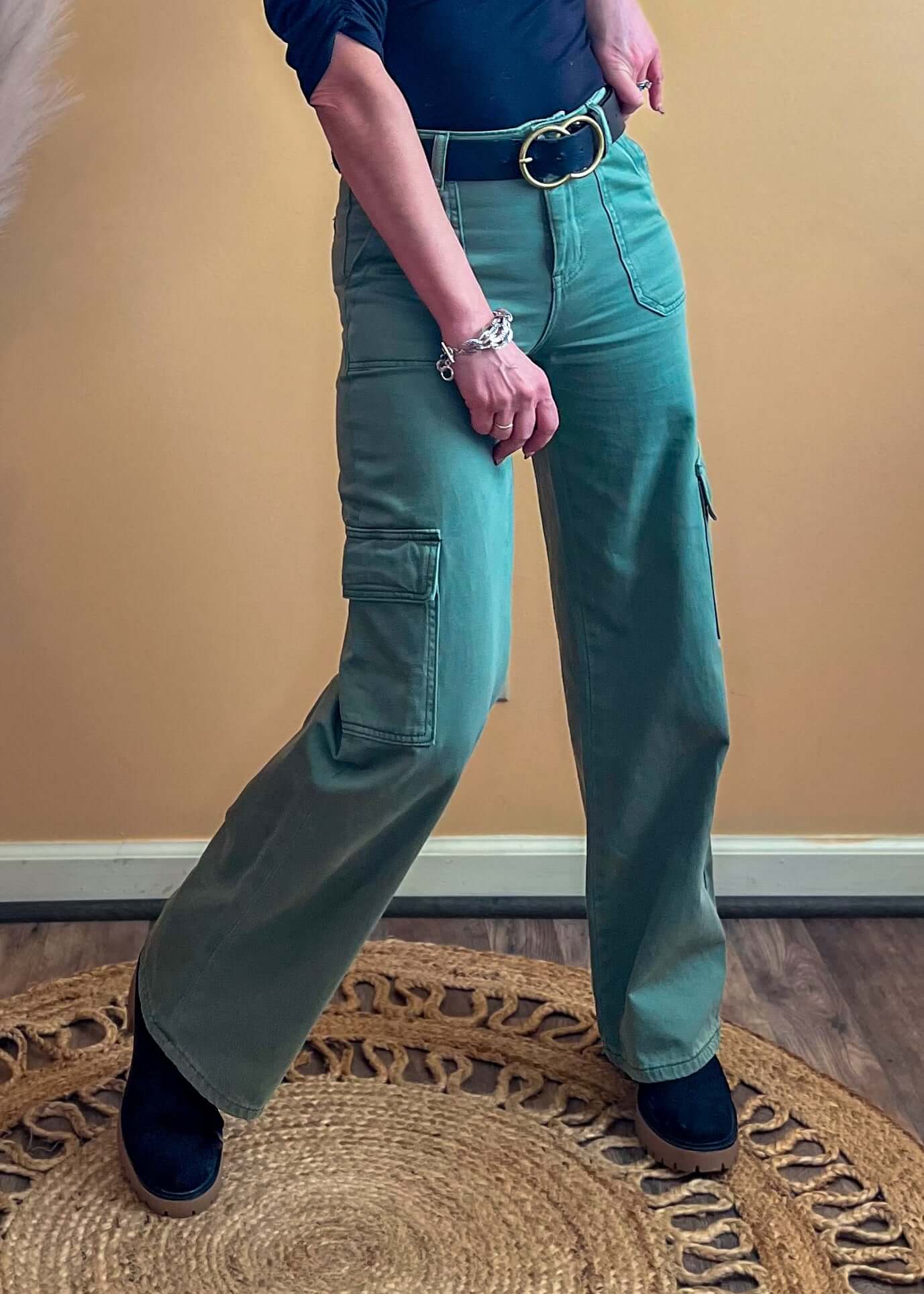 Front view of the Olivia High Rise Utility Cargo Wide Leg Jeans in chic Army Green color